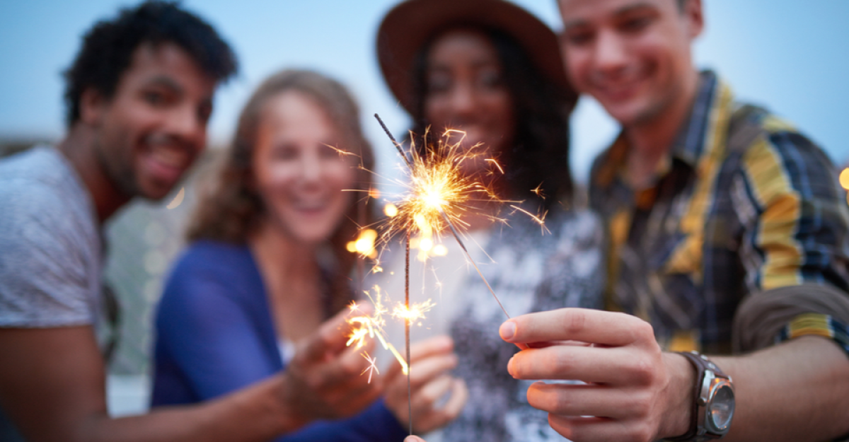Fireworks Sparklers held by Four People